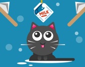 Кошка пьет молоко